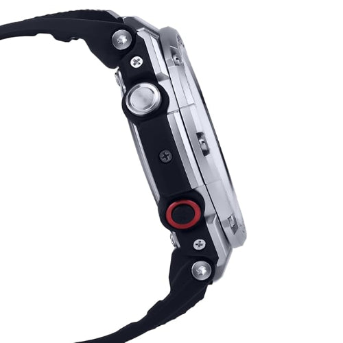 Close-up of a black and silver watch with a red button on a white background