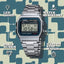 Casio digital watch with features highlighted on a patterned background